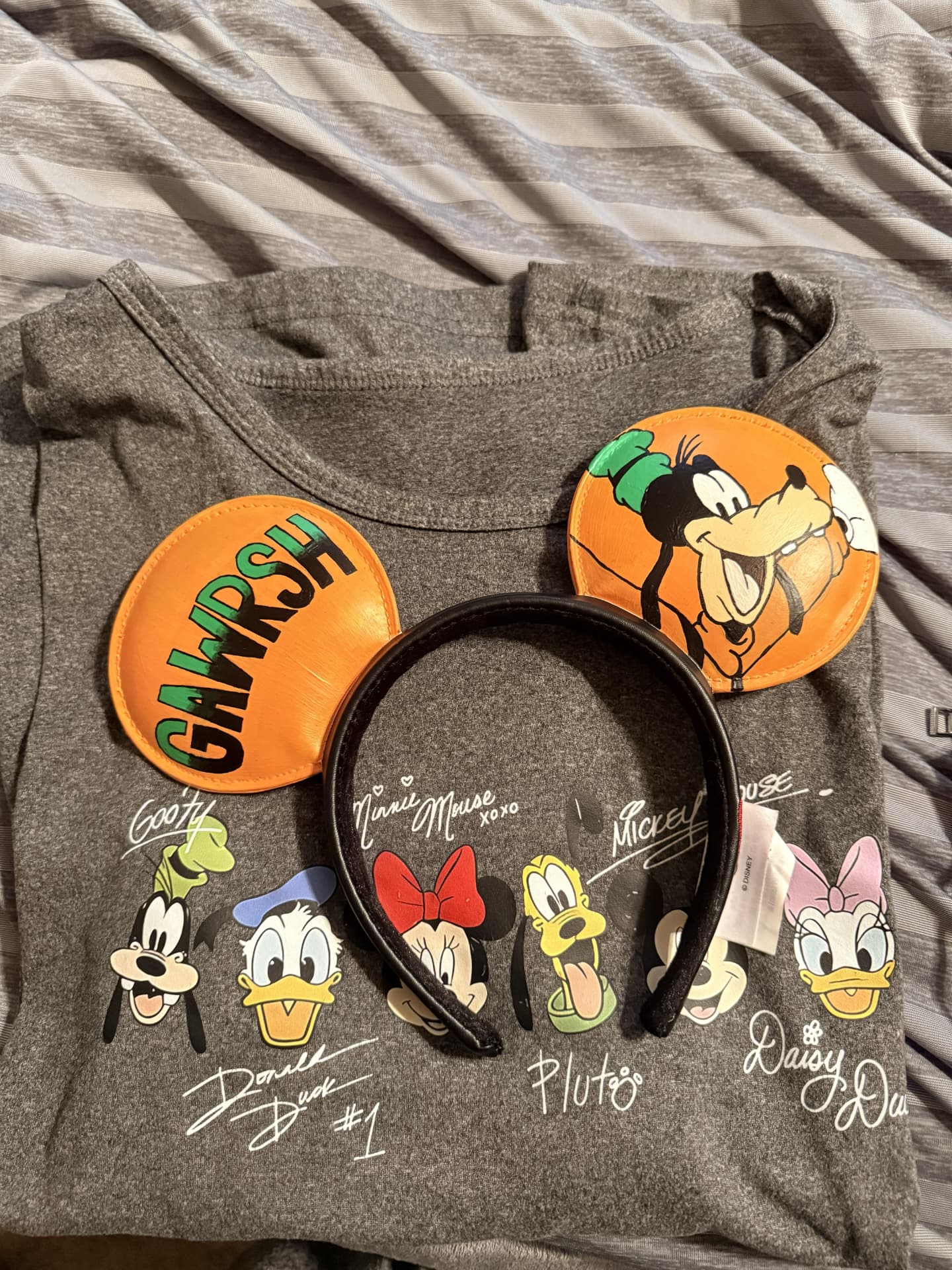 Goofy ear headband and classic Disney character shirt prepared for a Walt Disney World park day.